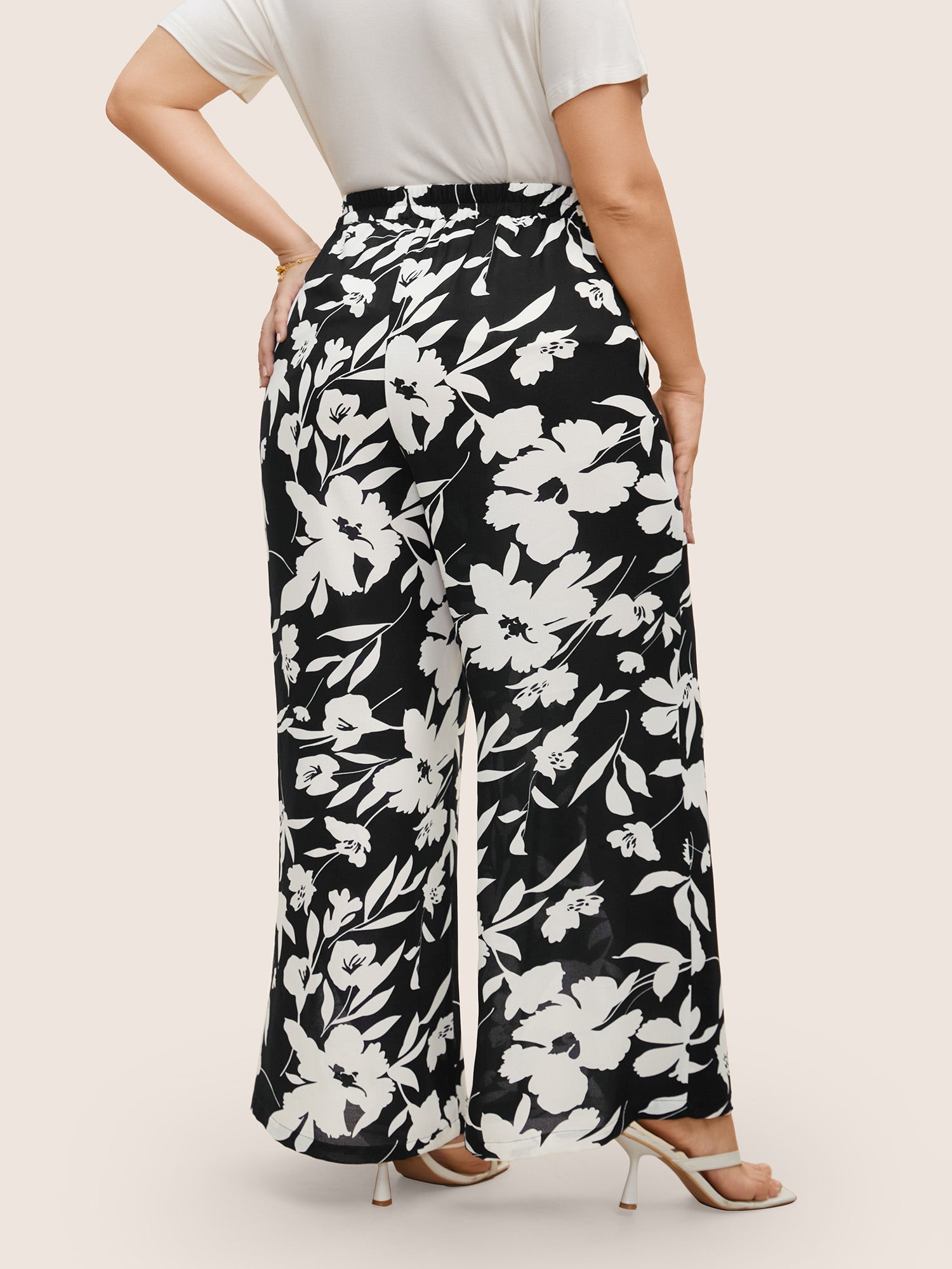 Silhouette broek met bloemenprint en stropdassen in zijnaden