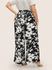 Silhouette broek met bloemenprint en stropdassen in zijnaden